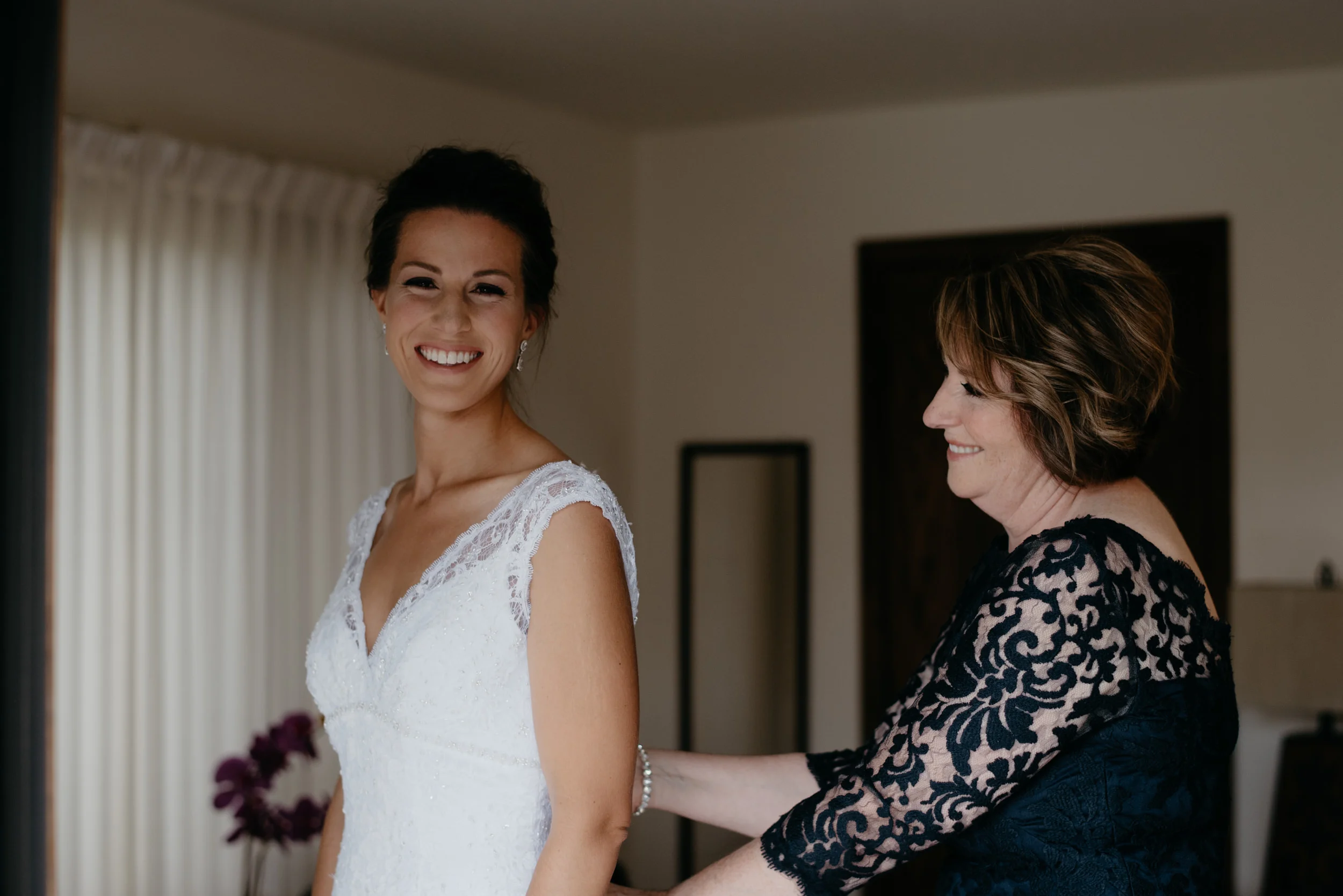  Bride getting dress on. Colorado elopement photographer. 3M Curve, Rocky Mountain National Park elopement. 