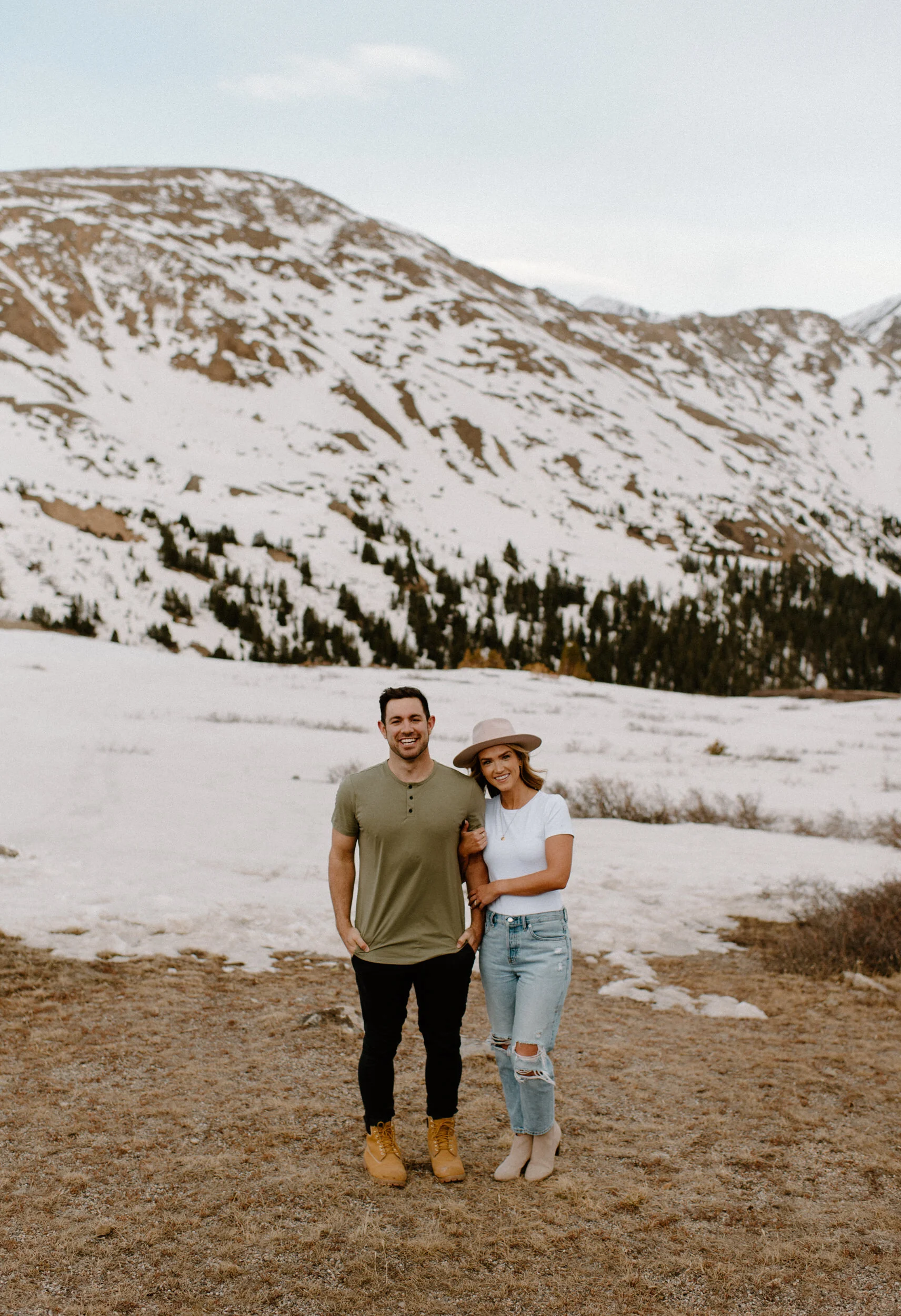  Colorado engagement session on Loveland Pass. Loveland Pass engagement photos.  Colorado wedding and elopement photographer, Alyssa Carpenter. Colorado wedding photography. Colorado adventure engagement session photographer. Mountain engagement session. Casual engagement session outfit ideas. Mountain engagement photo ideas.  
