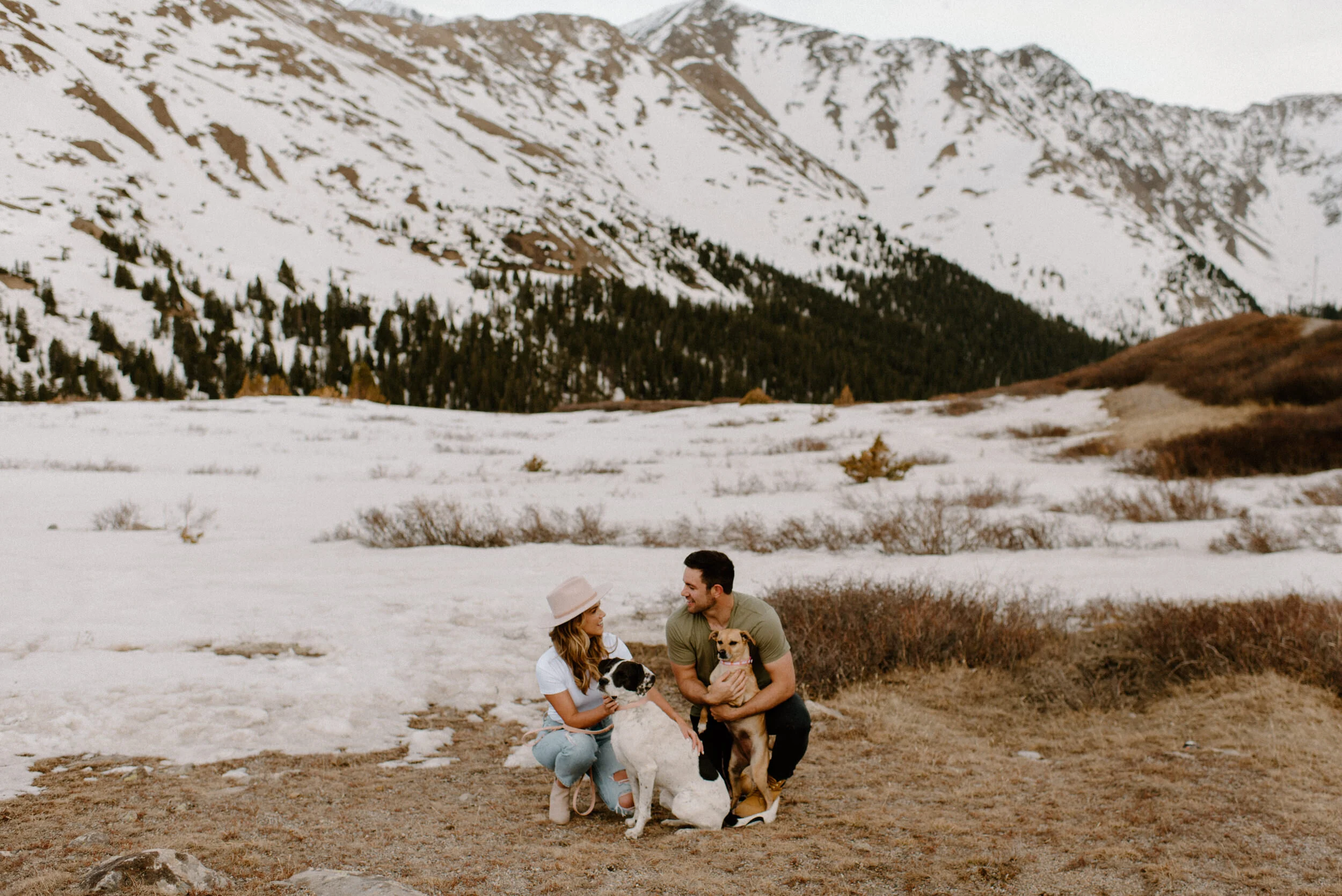  Loveland Pass engagement session. Loveland Pass engagement photos in Colorado. Engagement session with dogs. Save the date ideas with dogs. Colorado wedding photographer. Colorado elopement photography. Engagement session pose ideas with dogs. Alyssa Carpenter, Colorado engagement photographer.  