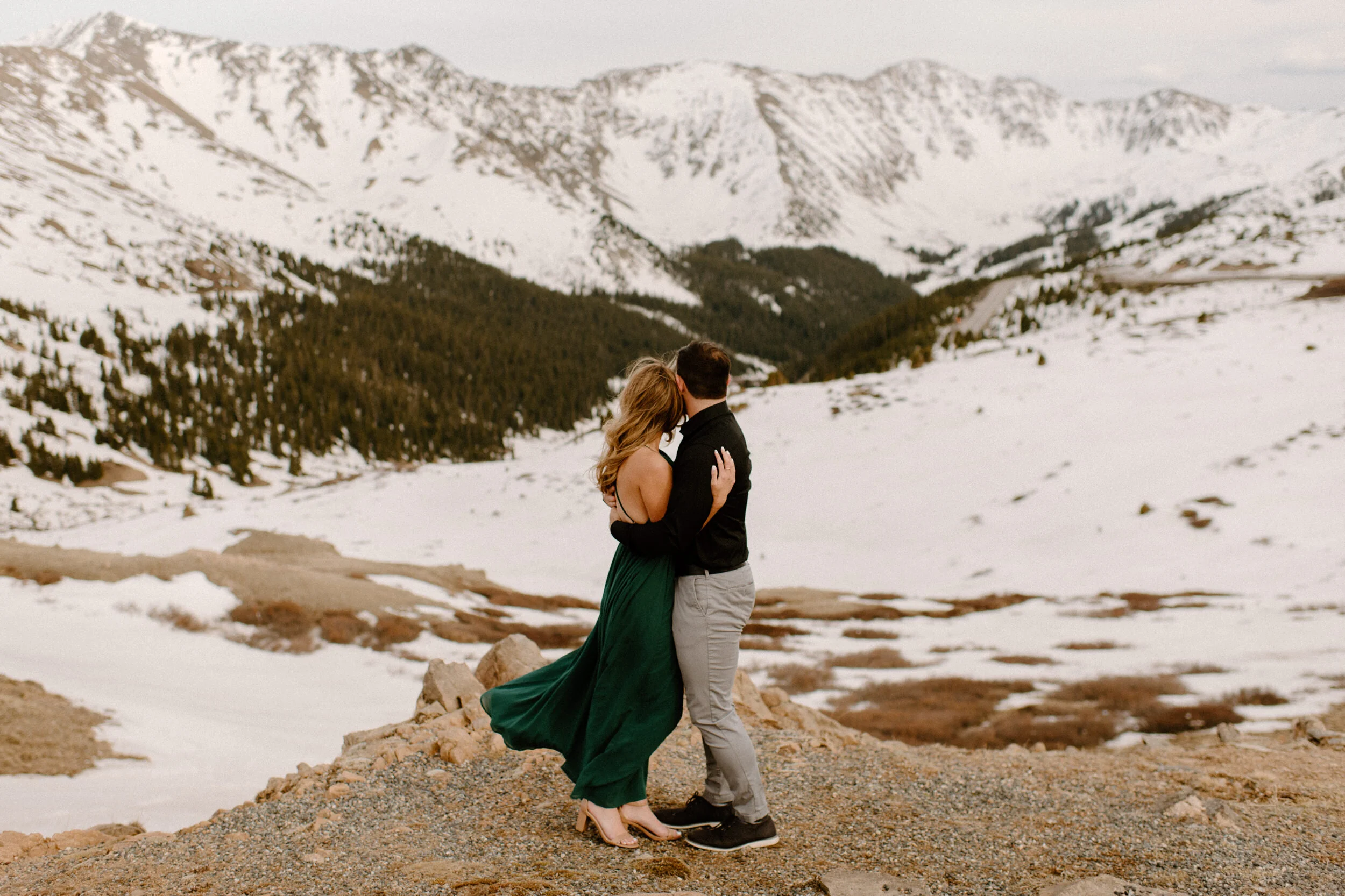  Snowy engagement session on Loveland Pass. Winter engagement photo ideas. Colorado wedding photographer. Loveland Pass engagement photos. Colorado elopement photographer.  Engagement session pose ideas.  