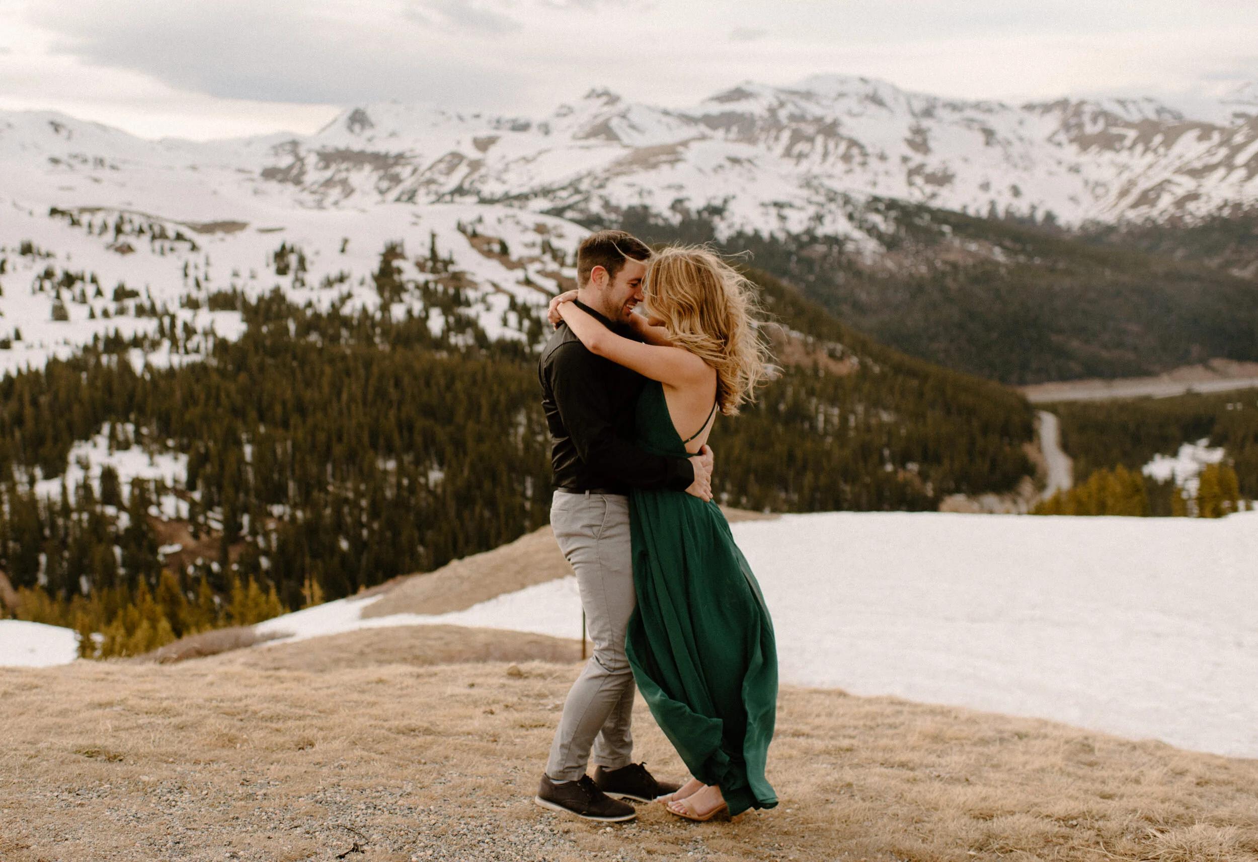  Colorado winer engagement photos on Loveland Pass. Loveland Pass engagement session. Colorado wedding and elopement photographer, Alyssa Carpenter. Adventure engagement photography. Engagement session dress ideas.  
