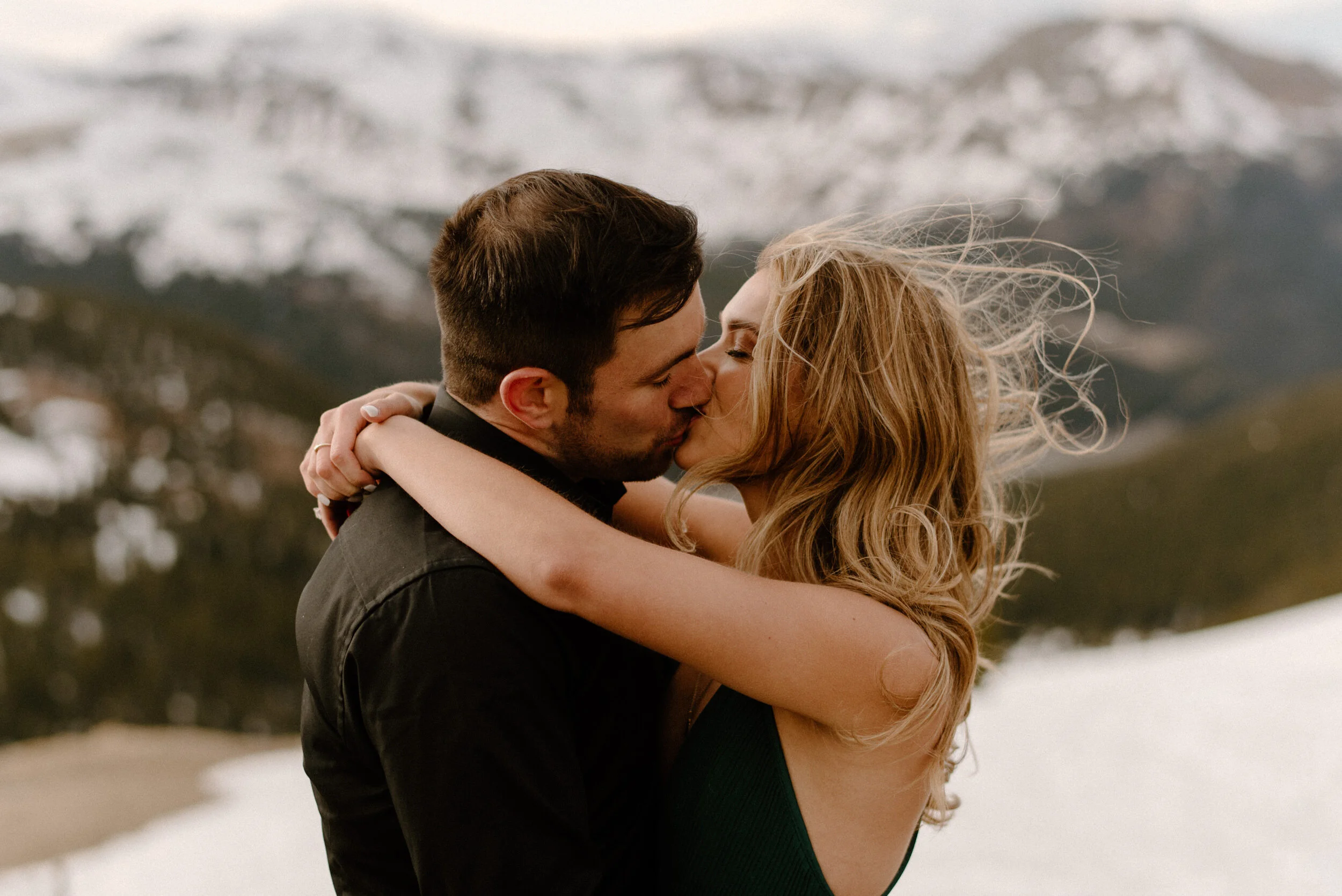  Colorado winer engagement photos on Loveland Pass. Loveland Pass engagement session. Colorado wedding and elopement photographer, Alyssa Carpenter. Adventure engagement photography. Engagement session dress ideas. Save the date pose ideas. Mountain engagement photos.  
