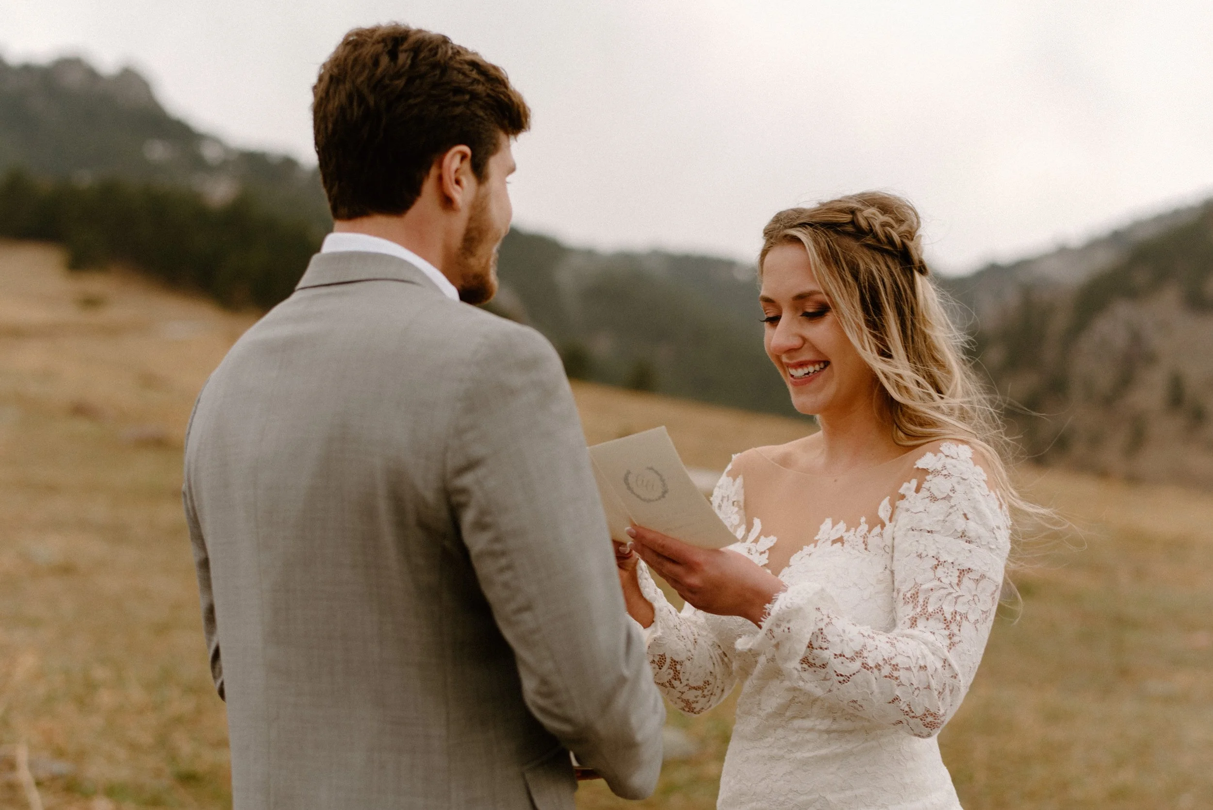 Elopement at Chautauqua Park in Boulder, Colorado. Couple exchanging vows at the Flatirons in Boulder. Colorado wedding photographer.