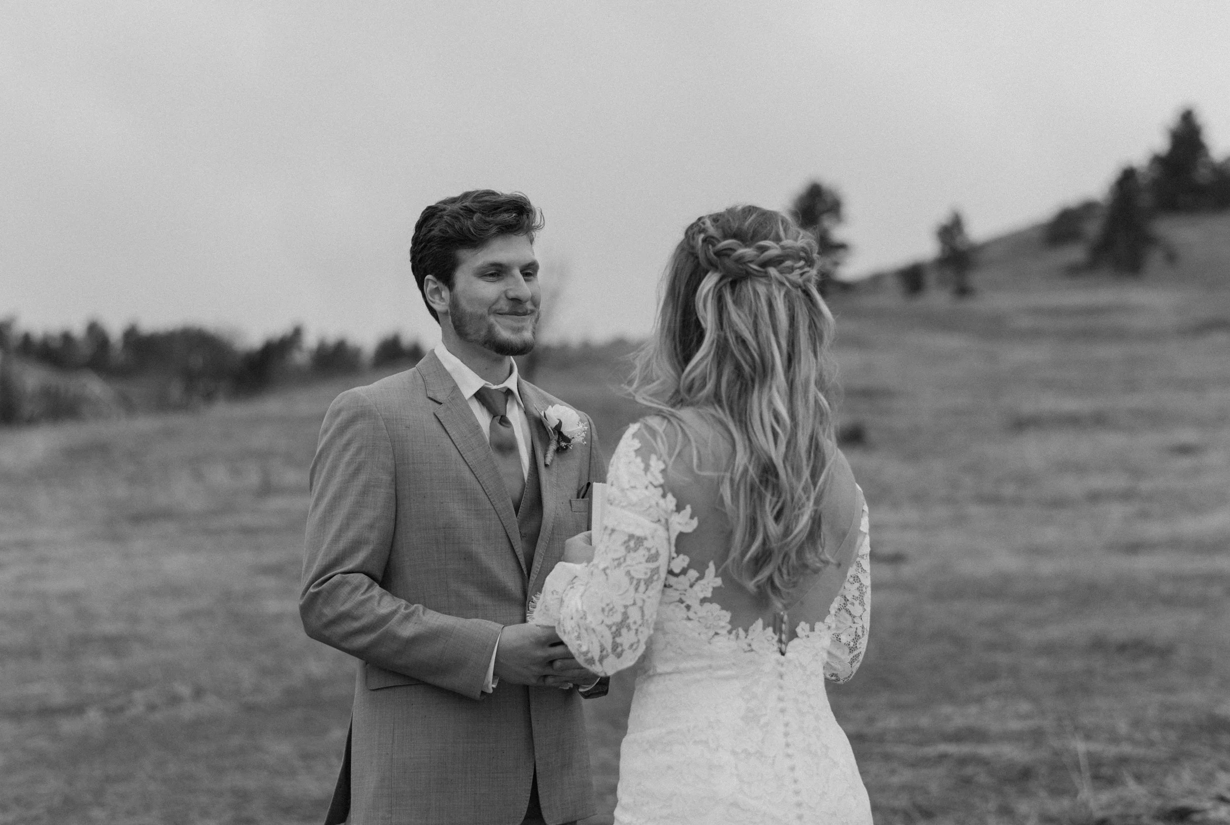 Colorado elopement in Boulder, Colorado at the Flatirons near Chautauqua Park. Bride and groom exchanging wedding vows. Colorado wedding photographer.