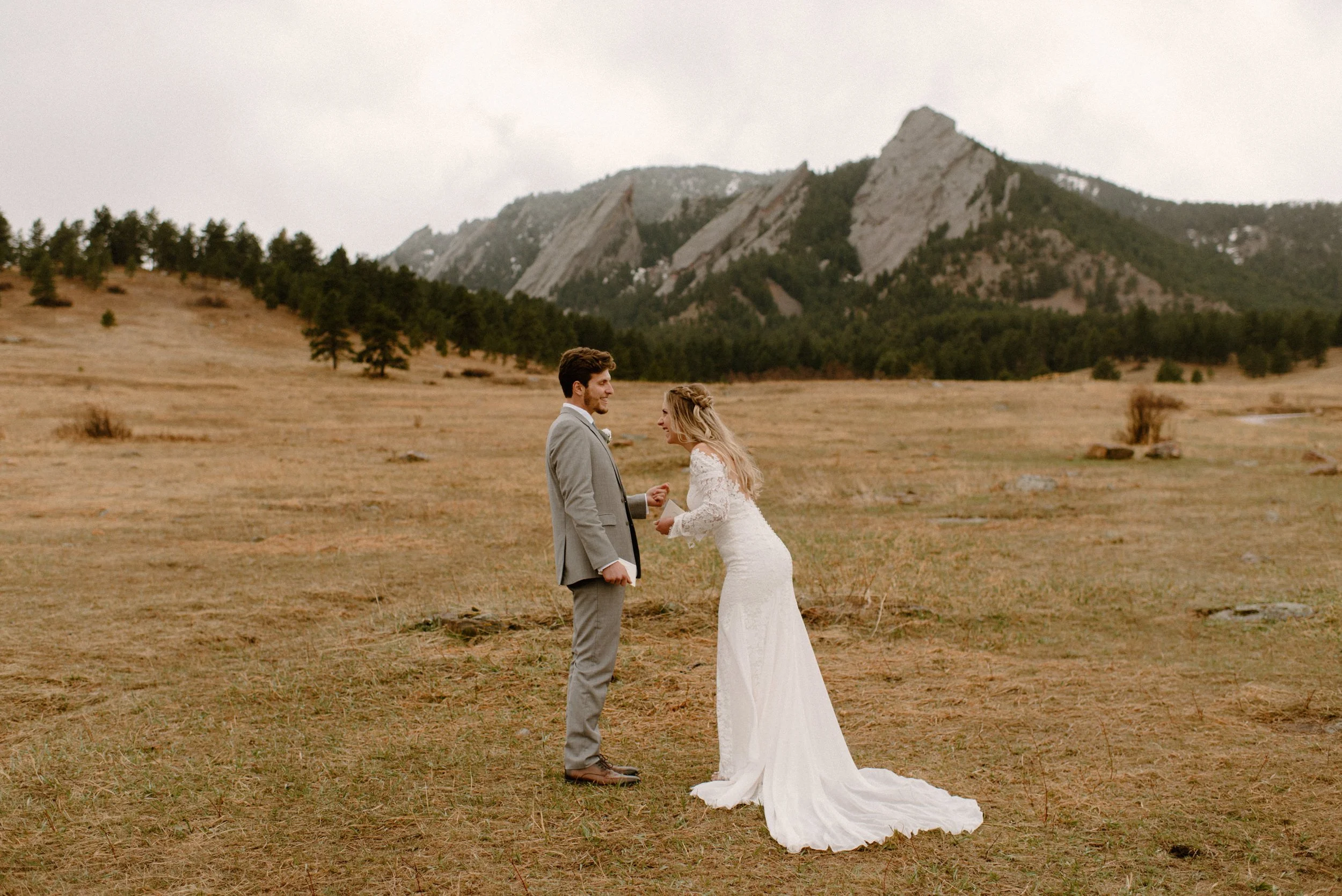 Colorado elopement in Boulder, Colorado at the Flatirons near Chautauqua Park. Bride and groom exchanging wedding vows.