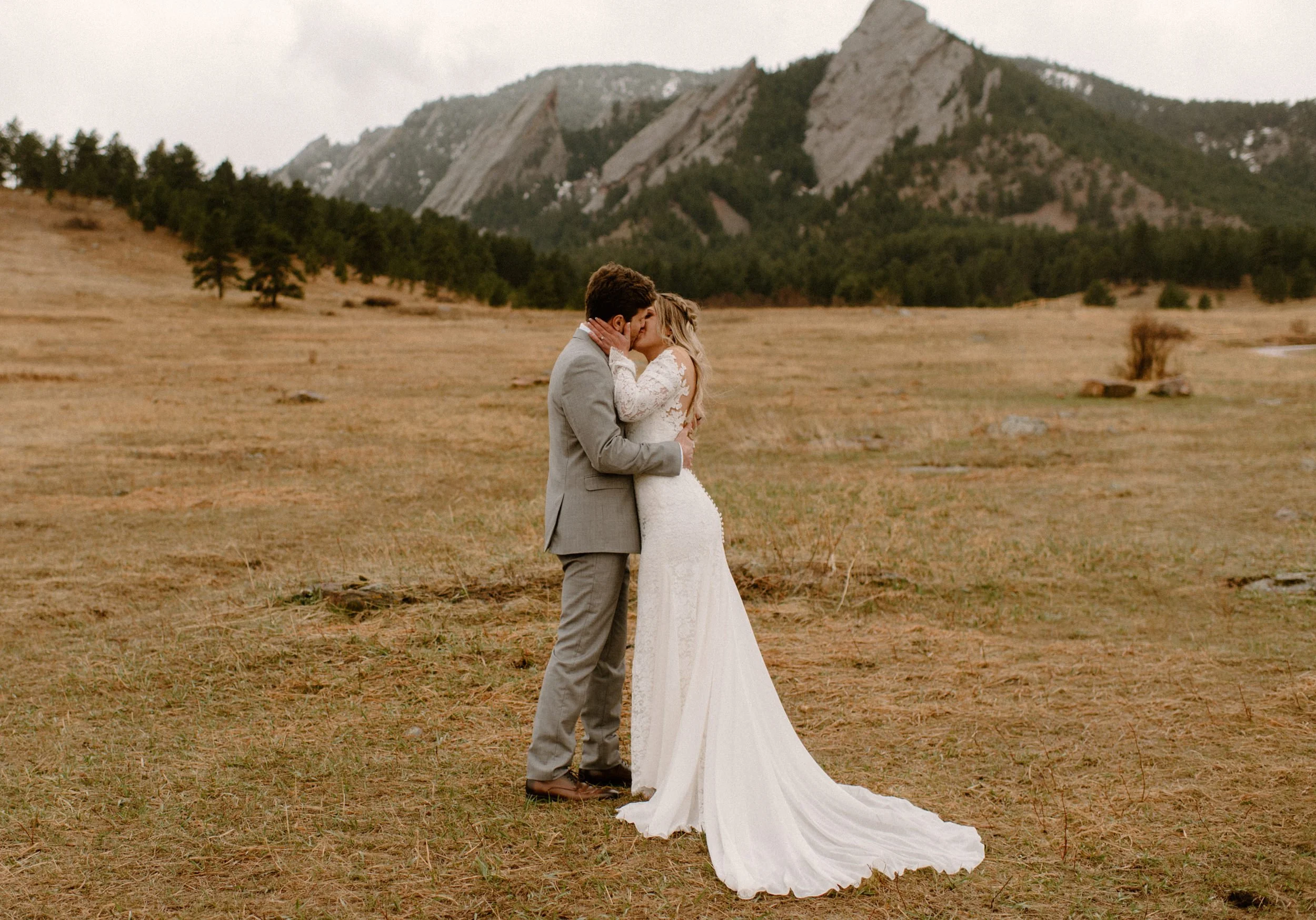 Colorado elopement in Boulder, Colorado at the Flatirons near Chautauqua Park. Bride and groom first kiss